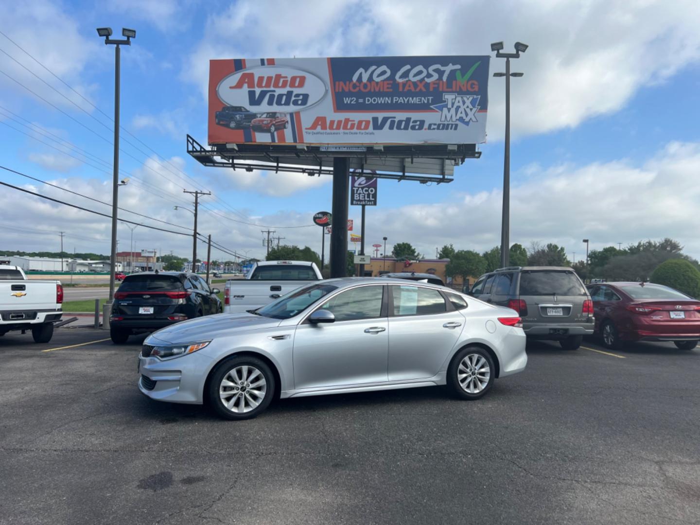 2016 SILVER Kia Optima LX (5XXGT4L30GG) with an 2.4L L4 DOHC 16V engine, 6A transmission, located at 420 I-35E, Lancaster, TX, 75146, (469) 297-4144, 32.593929, -96.823685 - Photo#0